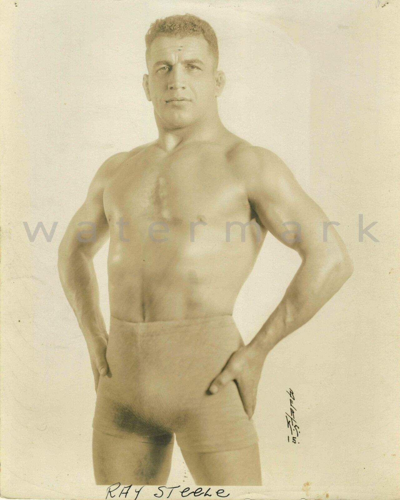 1930s wrestler Ray Steele in tight trunks. 16\