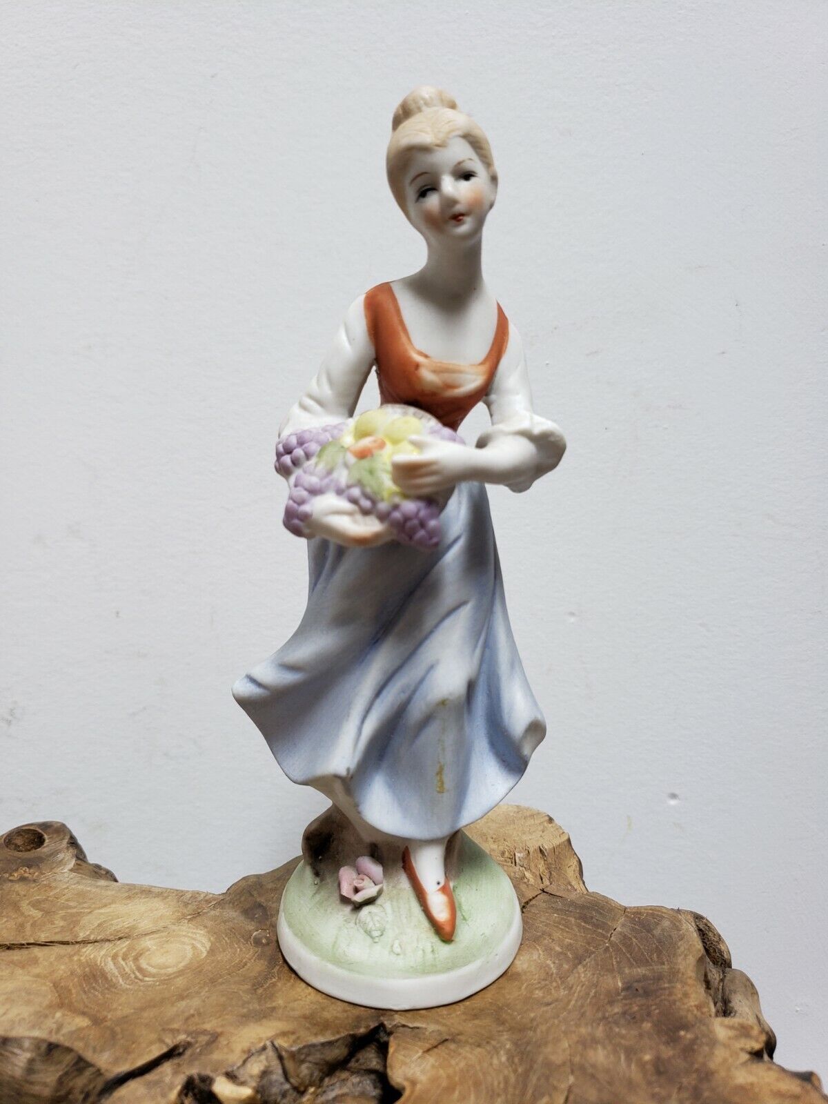    VINTAGE Porcelain Girl  holding a fruit basket figurines  6.5inch Height